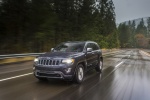 Picture of a driving 2014 Jeep Grand Cherokee Limited Diesel 4WD in Granite Crystal Metallic Clearcoat from a front left perspective