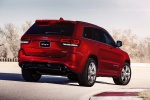 Picture of a 2014 Jeep Grand Cherokee SRT 4WD in Redline 2 Coat Pearl from a rear right three-quarter perspective