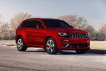 Picture of a 2014 Jeep Grand Cherokee SRT 4WD in Redline 2 Coat Pearl from a front right three-quarter perspective