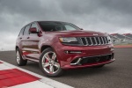 Picture of a 2014 Jeep Grand Cherokee SRT 4WD in Redline 2 Coat Pearl from a front right perspective