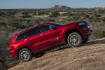 Picture of a 2014 Jeep Grand Cherokee Summit 4WD in Deep Cherry Red Crystal Pearlcoat from a right side perspective