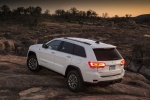 Picture of a 2015 Jeep Grand Cherokee Limited 4WD in Bright White Clearcoat from a rear left perspective