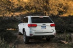Picture of a 2016 Jeep Grand Cherokee Limited 4WD in Bright White Clearcoat from a rear perspective