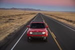 Picture of a driving 2016 Jeep Renegade Latitude 4WD in Colorado Red from a frontal perspective