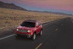 Picture of a driving 2016 Jeep Renegade Latitude 4WD in Colorado Red from a front left three-quarter perspective