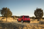 Picture of a 2017 Jeep Renegade Latitude 4WD in Colorado Red from a rear left perspective