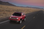 Picture of a driving 2018 Jeep Renegade Latitude 4WD in Colorado Red from a front left three-quarter perspective