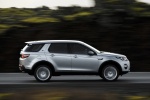 Picture of a driving 2015 Land Rover Discovery Sport HSE Luxury in Indus Silver Metallic from a right side perspective