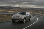 Picture of a driving 2018 Land Rover Discovery Sport HSE Luxury from a front left perspective