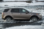 Picture of a driving 2019 Land Rover Discovery Sport HSE Luxury from a right side perspective