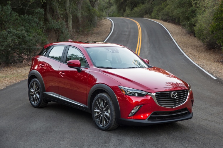 Picture of a 2016 Mazda CX-3 in Soul Red Metallic from a front right three-quarter perspective