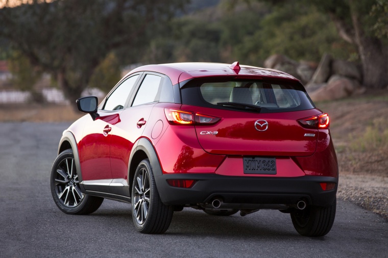 Picture of a 2016 Mazda CX-3 in Soul Red Metallic from a rear left perspective
