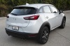 Picture of a 2016 Mazda CX-3 AWD in Crystal White Pearl Mica from a rear right perspective