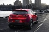 Picture of a 2016 Mazda CX-3 in Soul Red Metallic from a rear right perspective