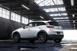 Picture of a 2016 Mazda CX-3 in Crystal White Pearl Mica from a rear left three-quarter perspective