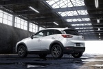 Picture of a 2017 Mazda CX-3 in Crystal White Pearl Mica from a rear left three-quarter perspective