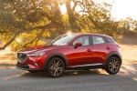Picture of a 2018 Mazda CX-3 in Soul Red Metallic from a side perspective
