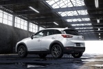 Picture of a 2018 Mazda CX-3 in Snowflake White Pearl Mica from a rear left three-quarter perspective