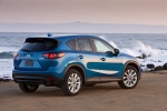 Picture of a 2014 Mazda CX-5 in Sky Blue Mica from a rear right three-quarter perspective