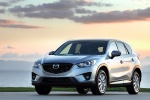 Picture of a 2014 Mazda CX-5 in Liquid Silver Metallic from a front left three-quarter perspective
