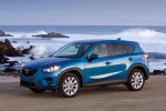 Picture of a 2014 Mazda CX-5 in Sky Blue Mica from a front left three-quarter perspective