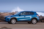 Picture of a 2014 Mazda CX-5 in Sky Blue Mica from a left side perspective