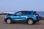 Picture of a 2015 Mazda CX-5 in Sky Blue Mica from a rear left three-quarter perspective