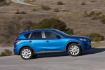 Picture of a 2015 Mazda CX-5 in Sky Blue Mica from a right side perspective