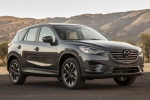 Picture of a 2016 Mazda CX-5 in Meteor Gray Mica from a front right perspective