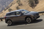 Picture of a driving 2016 Mazda CX-5 in Meteor Gray Mica from a front right three-quarter perspective