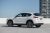 Picture of a 2017 Mazda CX-5 AWD in Snowflake White Pearl Mica from a rear left three-quarter perspective