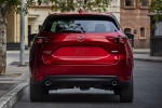 Picture of a 2017 Mazda CX-5 Grand Touring AWD in Soul Red Crystal Metallic from a rear perspective