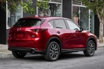 Picture of a 2017 Mazda CX-5 Grand Touring AWD in Soul Red Crystal Metallic from a rear right perspective