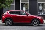 Picture of a 2017 Mazda CX-5 Grand Touring AWD in Soul Red Crystal Metallic from a right side perspective