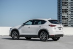 Picture of a 2018 Mazda CX-5 AWD in Snowflake White Pearl Mica from a rear left three-quarter perspective
