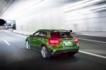 Picture of a driving 2019 Mercedes-AMG GLA 45 4MATIC from a rear left perspective