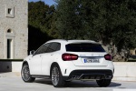 Picture of a 2019 Mercedes-AMG GLA 45 4MATIC in Polar White from a rear left perspective