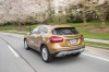 Picture of a driving 2020 Mercedes-Benz GLA 250 4MATIC from a rear left perspective