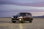 Picture of a 2017 Nissan Armada Platinum in Forged Copper from a front left three-quarter perspective