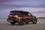 Picture of a 2018 Nissan Armada Platinum in Forged Copper from a rear right three-quarter perspective