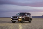 Picture of a 2019 Nissan Armada Platinum in Forged Copper from a front left three-quarter perspective