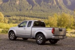 Picture of a 2014 Nissan Frontier King Cab PRO-4X 4WD in Brilliant Silver from a rear left three-quarter perspective