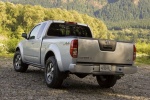 Picture of a 2014 Nissan Frontier King Cab PRO-4X 4WD in Brilliant Silver from a rear left perspective