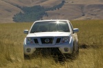 Picture of a 2014 Nissan Frontier King Cab PRO-4X 4WD in Brilliant Silver from a front left perspective