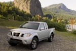 Picture of a 2014 Nissan Frontier King Cab PRO-4X 4WD in Brilliant Silver from a front left three-quarter perspective