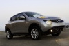 Picture of a 2014 Nissan Juke SL AWD in Brilliant Silver from a front right three-quarter perspective