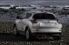 Picture of a 2014 Nissan Juke SL AWD in Brilliant Silver from a rear left perspective