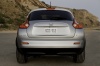 Picture of a 2014 Nissan Juke SL AWD in Brilliant Silver from a rear perspective