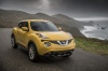 Picture of a 2015 Nissan Juke SL AWD in Solar Yellow from a front right perspective