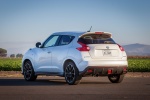 Picture of a 2016 Nissan Juke NISMO in White Pearl from a rear left three-quarter perspective